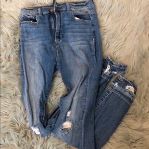 Medium wash skinny jeans with fun ankle distress